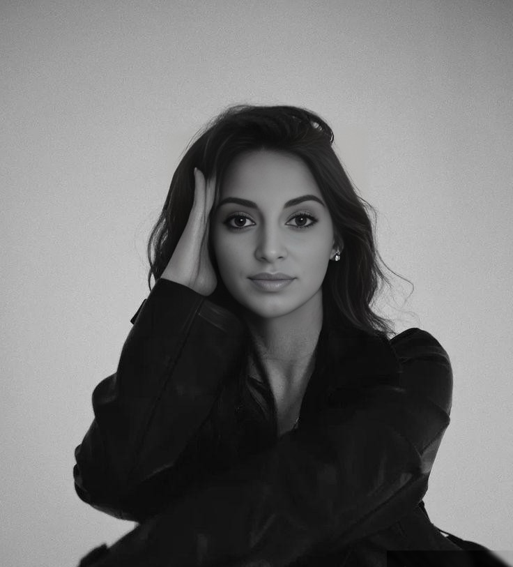 Cezara, founder of Glow Naturally, surrounded by natural skincare products